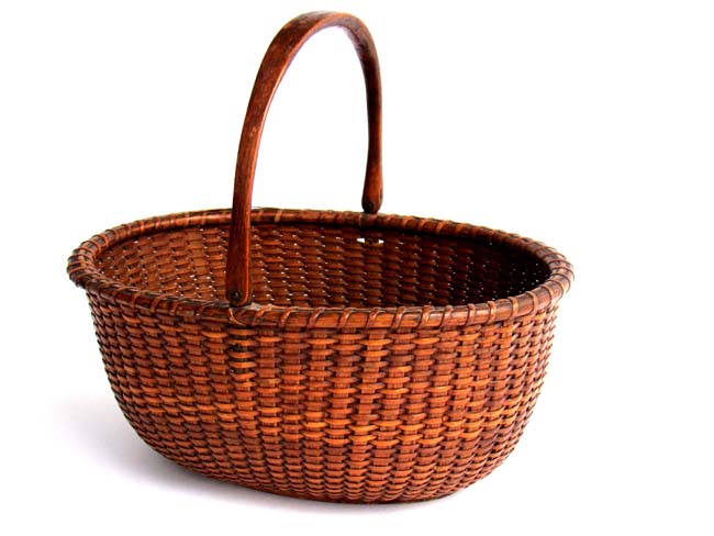 An Exceptional late 19th century Oval Nantucket Swing Handle Basket
